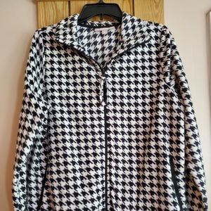 Woman within. Houndstooth jacket.